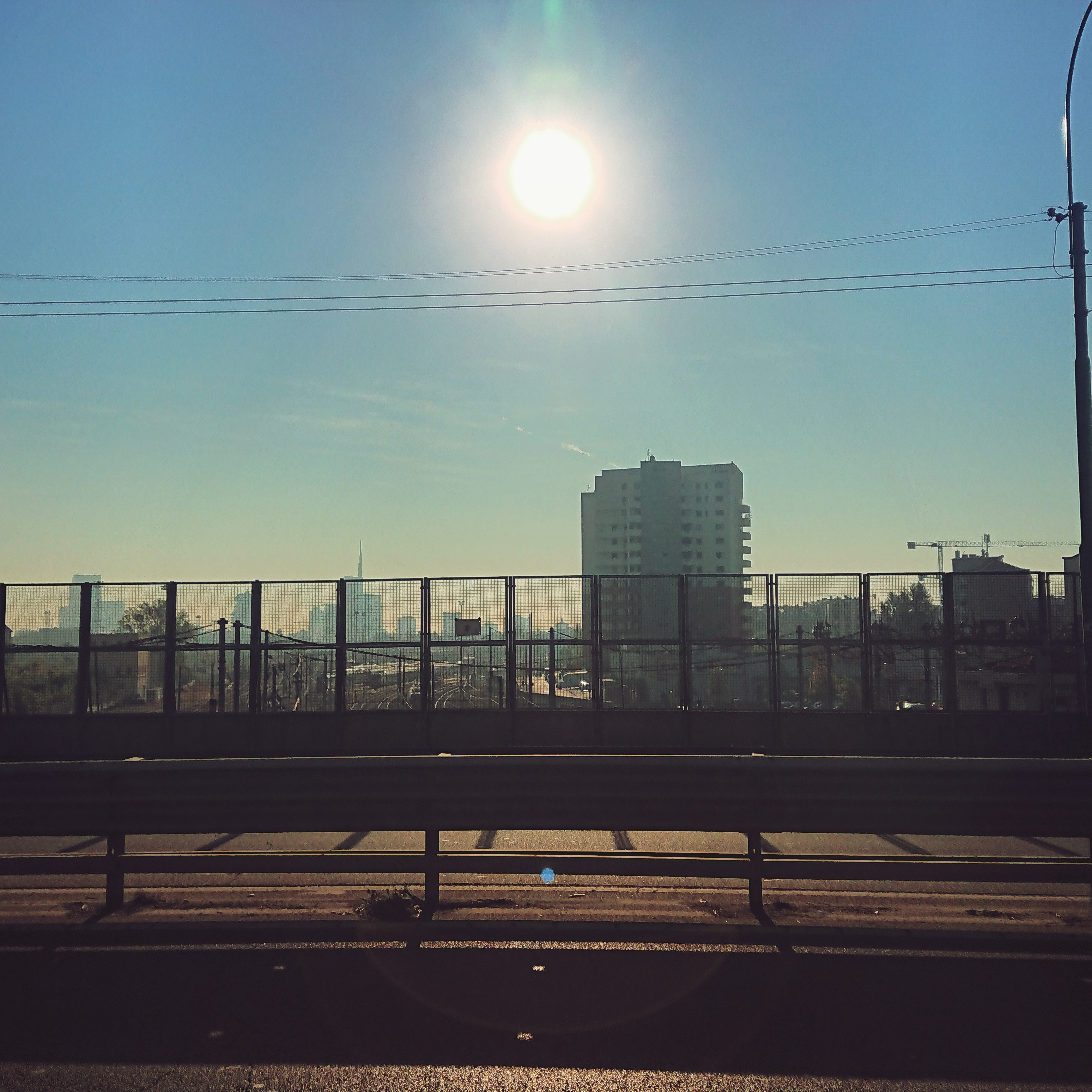 Bridge, rails and scorching sun